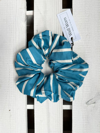 blue stripe scrunchie on wooden table