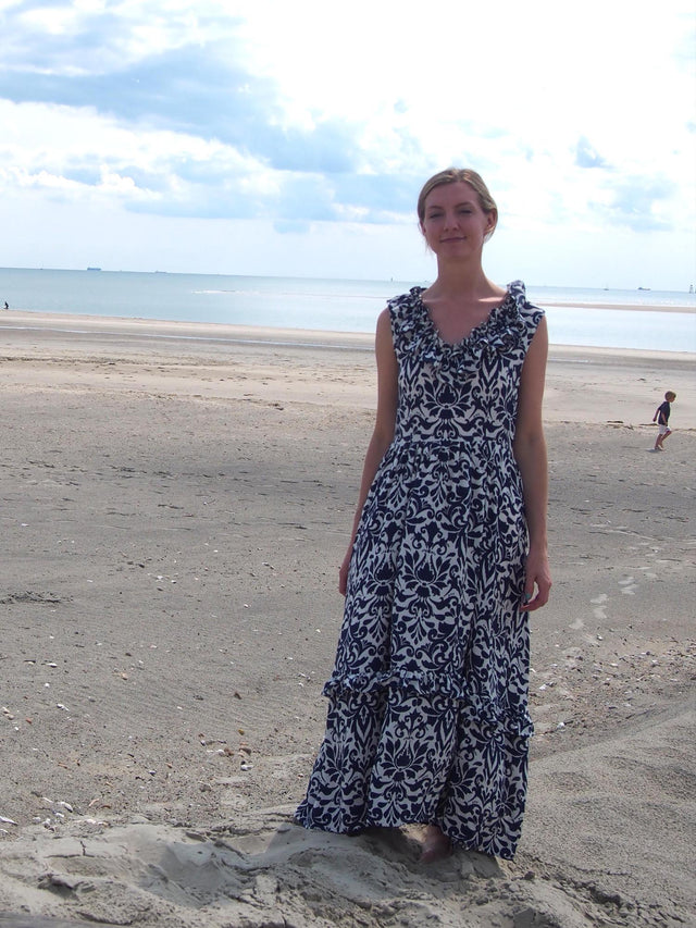 The Well Worn woman on beach in dress