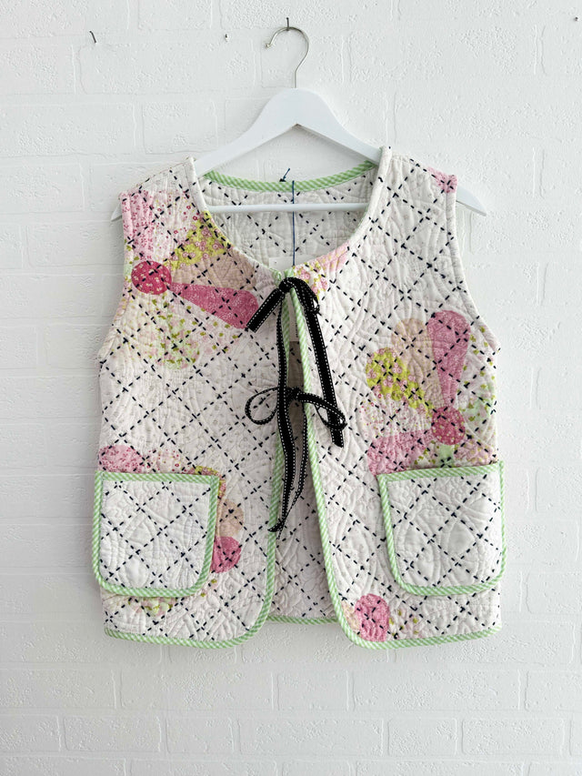 The Well Worn quilted waistcoat hanging on wall