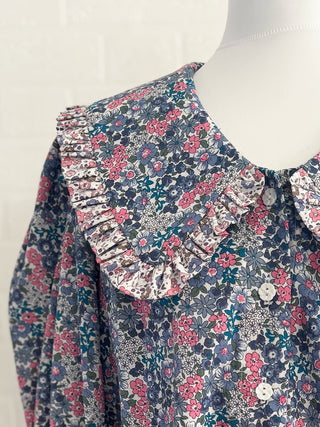 mixed floral blouse on mannequin