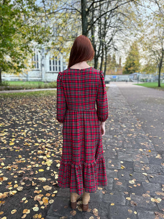 back women wearing tartan dress