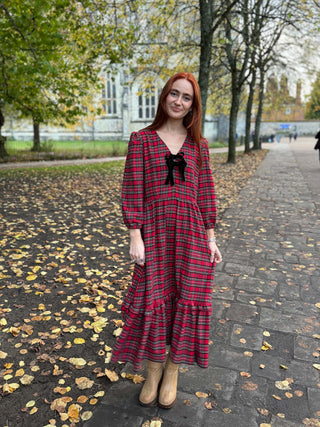 women wearing tartan dress outside