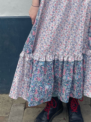 women wearing mixed print skirt detail
