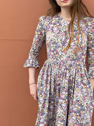 women wearing floral print midi dress detail