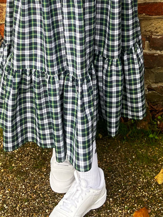 women wearing tartan skirt detail