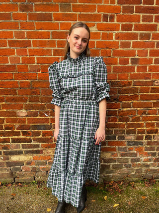 women wearing green tartan outfit