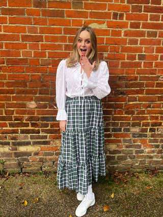 women wearing tartan skirt