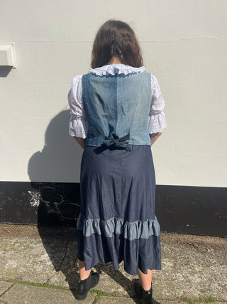 women wearing chambray skirt back view