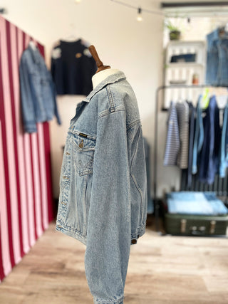 mended denim jacket on mannequin side