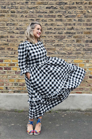 women wearing black and white dress