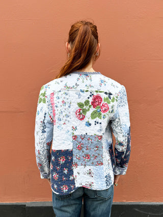 women wearing quilted jacket back view
