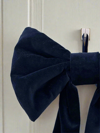 blue velvet bow on door