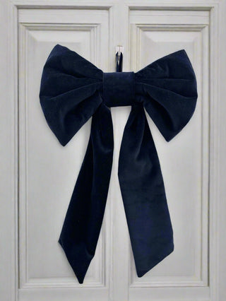 navy velvet bow on door