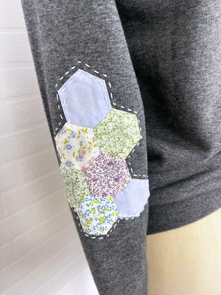 upcycled patchwork sweatshirt detail