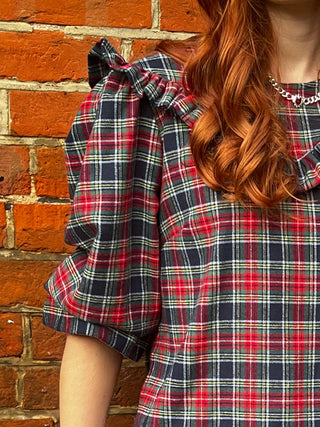 women wearing tartan rufled top detail