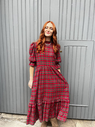 women wearing red tartan dress