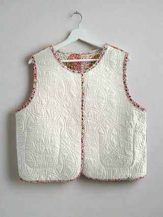 quilted waistcoat hanging on wall