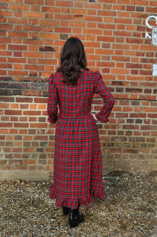 back view of red check dress