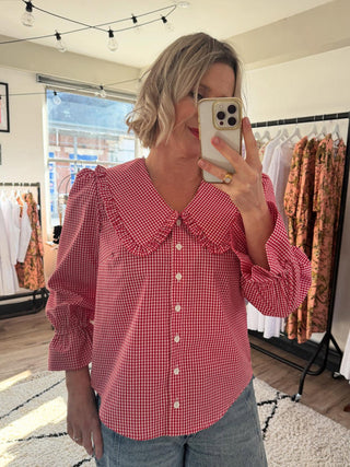 women wearing gingham blouse