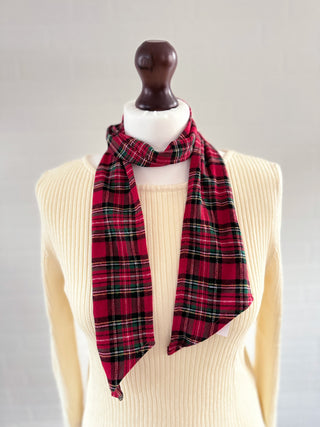 red stewart tartan scarf on mannequin