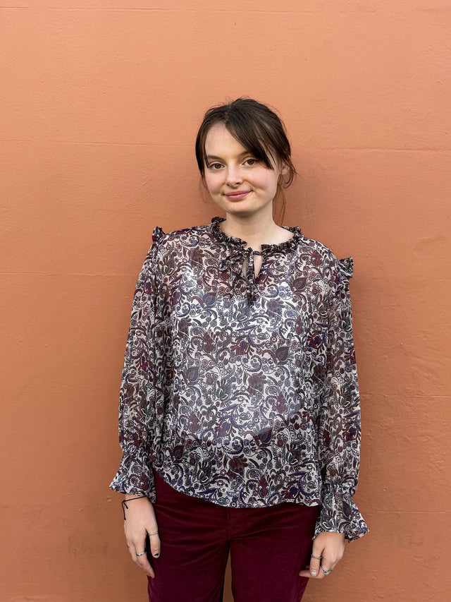 The Well Worn women wearing paisley boho blouse front view