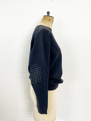 reworked sweatshirt on mannequin