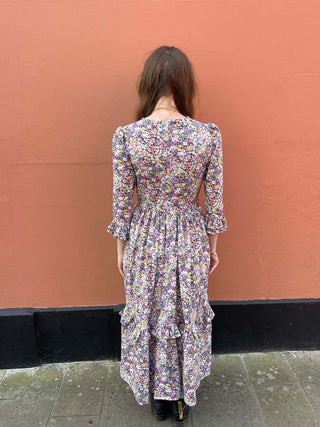 women wearing floral print midi dress back