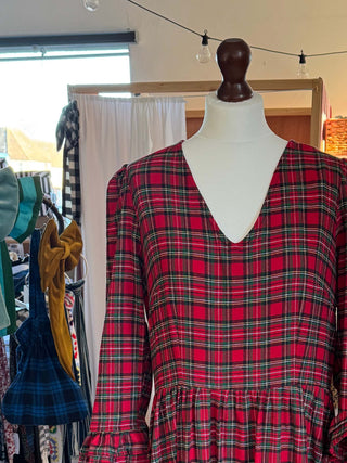 detail red tartan dress on mannequin