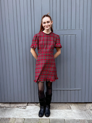 women wearing tartan mini dress