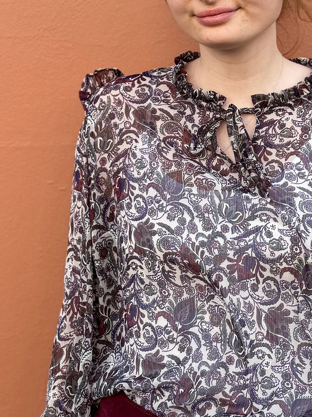 The Well Worn women wearing paisley boho blouse detail