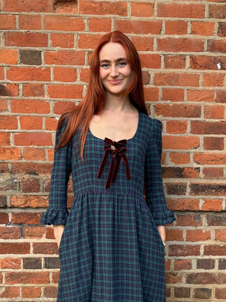 women wearing tartan dress bow detail