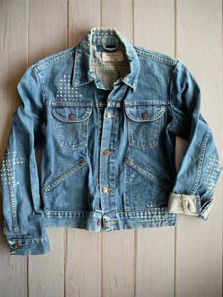 stitched-denim-jacket-on-table